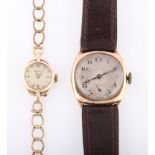 A 1920s 9ct yellow gold cased gents wrist watch, hallmarked Birmingham 1929, on a brown material
