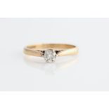 A hallmarked 9ct yellow gold diamond solitaire ring, set with a round brilliant cut diamond,