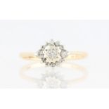 A 9ct yellow gold diamond set cluster ring, set with variously sized round brilliant cut diamonds,