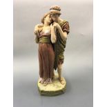 A Royal Dux figurine group depicting classical style couple embracing. Height 58cm.