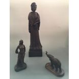 Three resin figurines, two by John Letts depicting HM Queen Elizabeth II commemorating the Silver