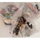 Three bags of costume jewellery.