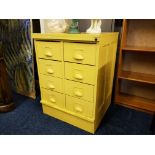 A painted eight drawer index chest.