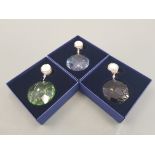 Three boxed Swarovski crystal hanging ornaments.