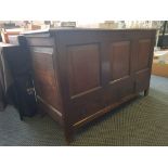 An 18th Century oak mule chest fitted with two drawers to base and three panels to front.