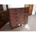 A Victorian mahogany four short over three long chest of drawers.