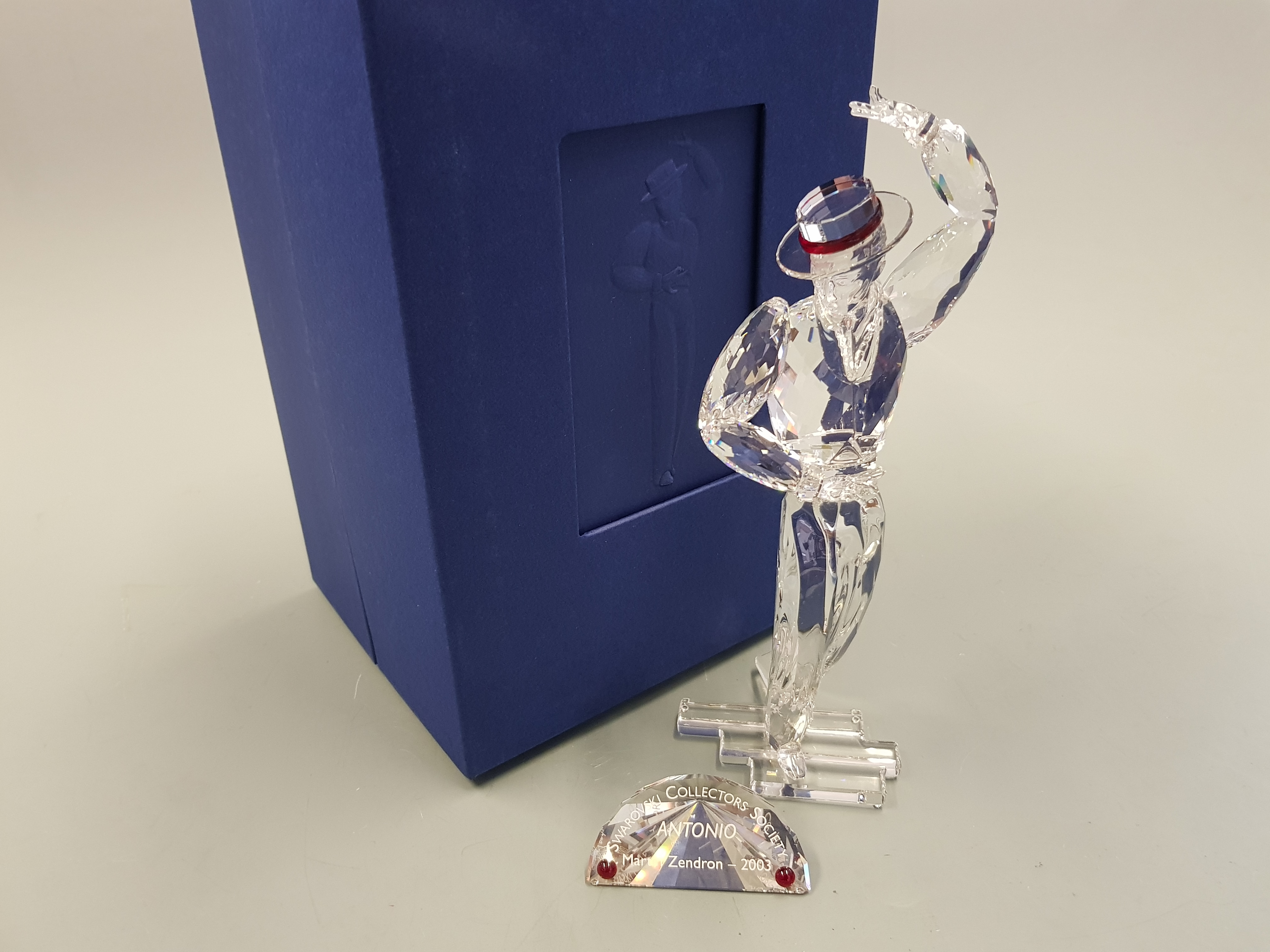 A boxed Swarovski figure 'Magic of Dance', Antonio 2003 with boxed crystal plaque, by Martin