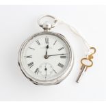 A silver Victorian Waltham open face key wind pocket watch, the white enamel dial having hourly