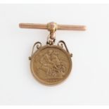A Victoria 1887 full sovereign, mounted in a pendant frame with T-bar, stamped 9ct.