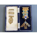 Two Masonic medals, one 15ct yellow gold with enamel, hallmarked Birmingham (date letter rubbed),