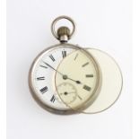 A silver Victorian T. Ganter open face crown wind pocket watch, the white enamel dial having