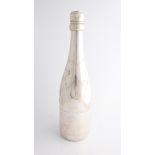 A silver Asprey champagne bottle, with engraved detailing, hallmarked London 1994, stamped Asprey,