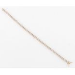 A hallmarked 9ct yellow gold diamond bracelet, each articulated link set with four eight cut