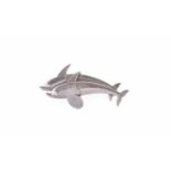 An Arno Malinowski for Georg Jensen brooch, in the form of two dolphins, design no. 317, stamped