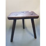 A Sheffield Cutler elm top stool with oak ribbed legs.