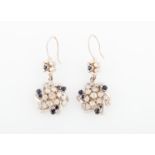 A pair of sapphire and diamond cluster design drop earrings, set with variously sized round