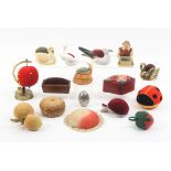 Eighteen larger format pin cushions mostly 20th Century, in various materials including four