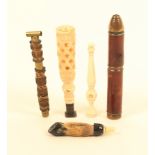 Five objects with Stanhopes comprising a bullet shaped wood and brass example as a cheroot holder (