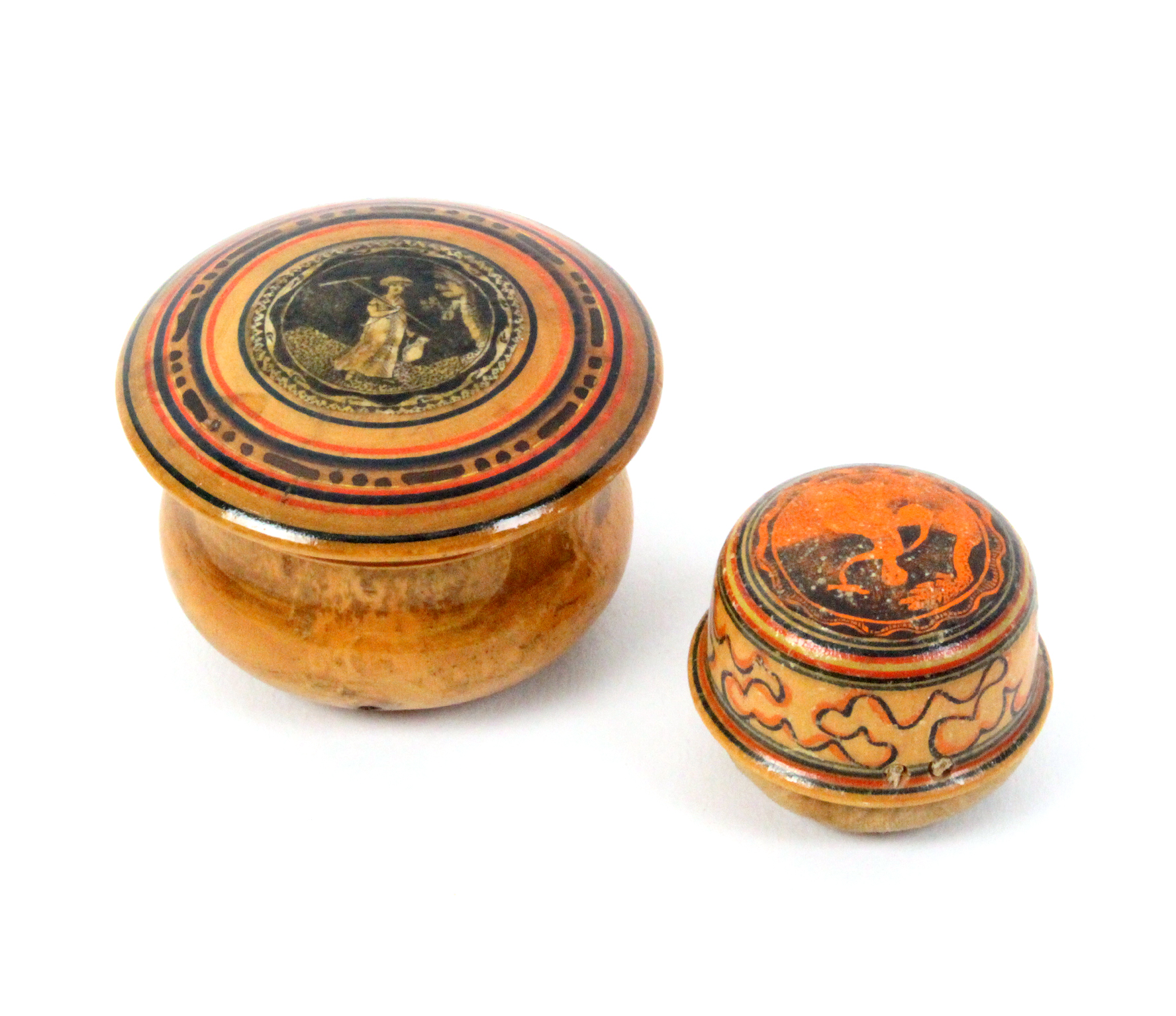 Two pieces of painted whitewood Tunbridge ware comprising a turned circular pin cushion with seaweed