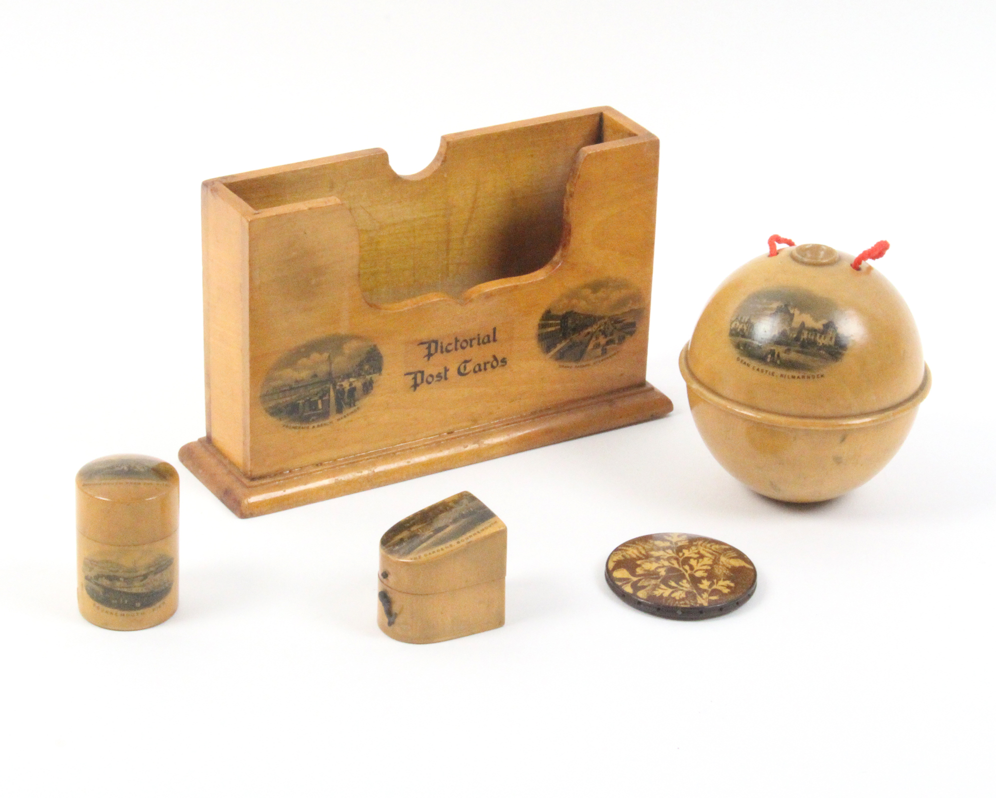 Mauchline ware - five pieces - comprising a 'Pictorial Post Card' stand (Promenade and Beach