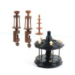 A mixed lot - sewing - comprising an ebony reel stand of two circular tiers, five bone top reel