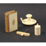 Four 19th Century ivory pieces comprising a chamber stick with carved stiff leaf decoration,