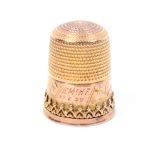 A 9ct gold thimble by James Swann and Son, engraved frieze initialled and dated '17-6-39',