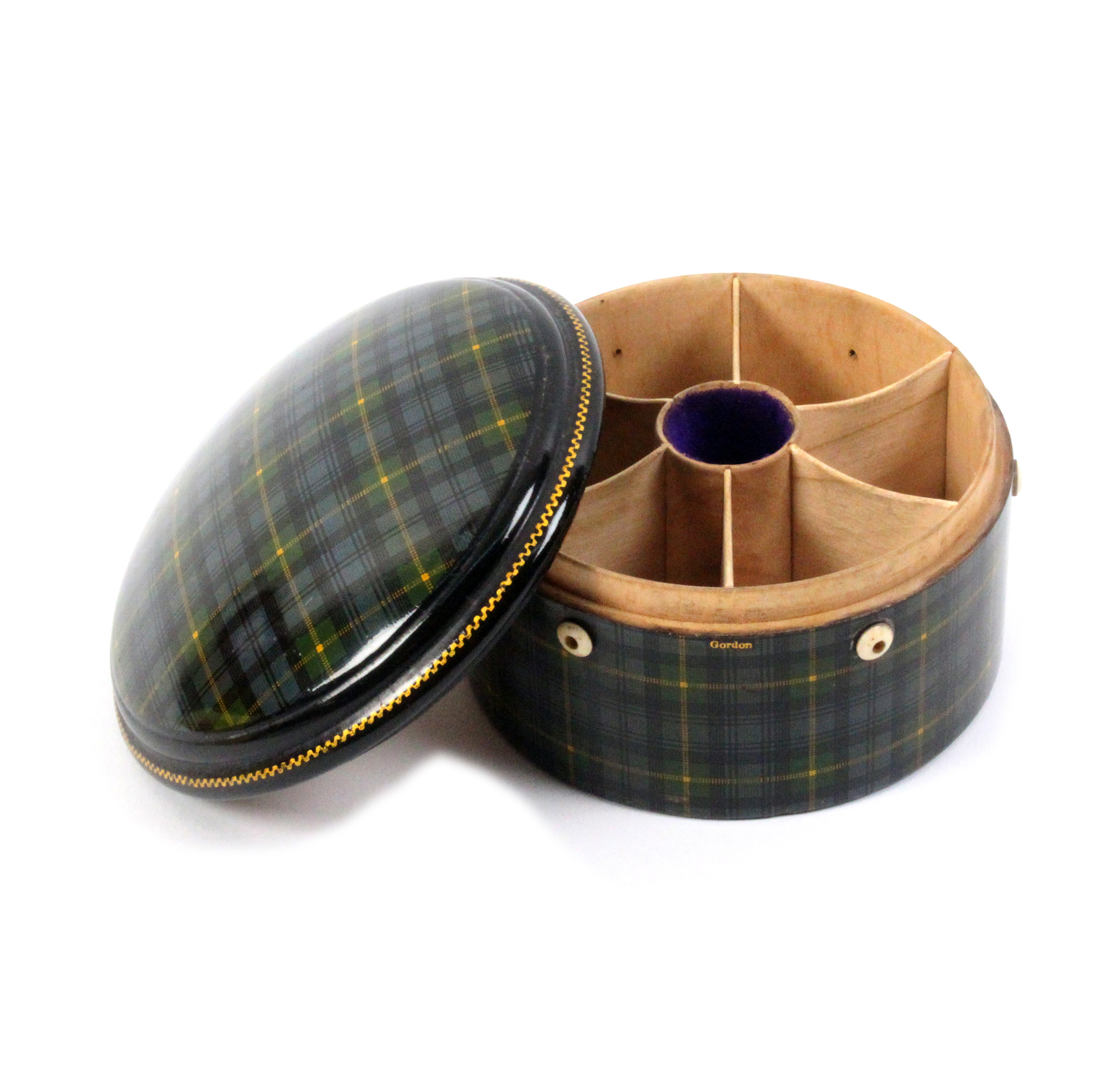 A good Tartan ware (Gordon) circular reel box, domed lid with fancy gilt border, six bone apertures,