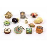 Twelve tape measures comprising four novelty celluloid examples, a pear, 6cm, a plum, a galleon, and