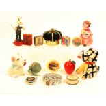 A collection of later tape measures including two large ceramic dog form examples, largest, 11cm,