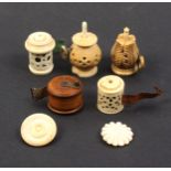 Five tape measures comprising two in vegetable ivory, one chips to base, largest 5cm, two 19th