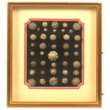 Buttons - dress and costume - three framed displays comprising a framed display of 29 featuring