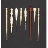 Crochet hooks and two stilettos, comprising a reversible ivory stiletto carved with leaves and
