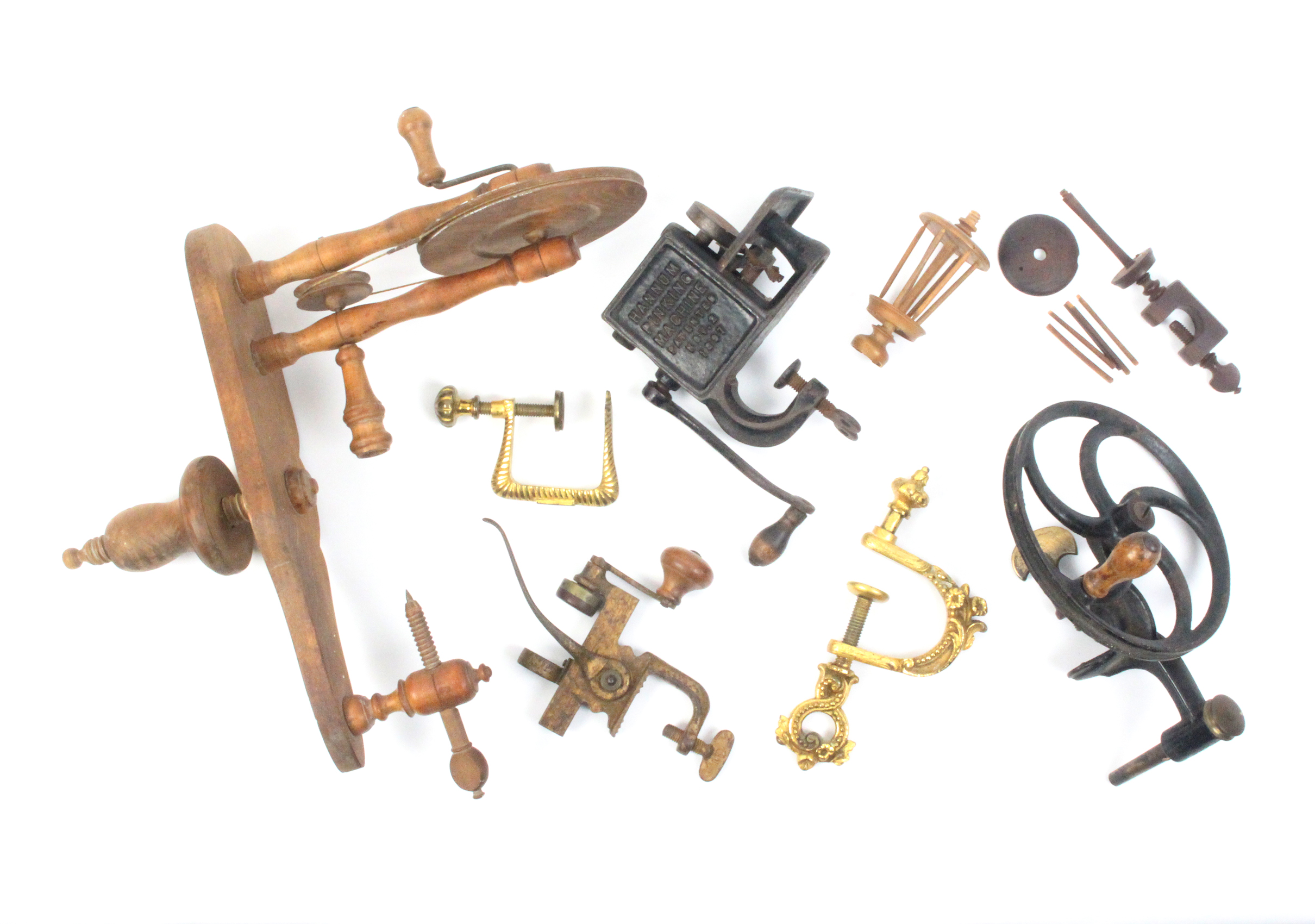 Six larger format clamps comprising a wooden clamp for winding reels, 33cm, another in cast iron,