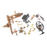 Six larger format clamps comprising a wooden clamp for winding reels, 33cm, another in cast iron,