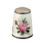 A Norwegian enamel and white metal thimble by David Andersen decorated with flowers, internal apex