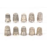 Ten English silver thimbles, all hallmarked, all with attractive decoration (10)