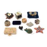 Twelve pin cushions and pin retainers including three card examples for toilet pins, a large blue