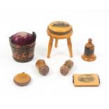 Mauchline ware - sewing - seven pieces comprising a pincushion in the form of a stool (J. Gould