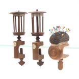 Three wooden sewing clamps comprising a turned cylinder example with pin cushion top, Ex. W. J.