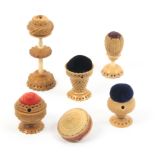 Six various vegetable ivory pin cushions, two lacking basket form handles, one with reel stem, 9.5cm