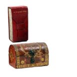 Two needle packet boxes comprising a French red leather and gilt tooled example with domed lid, 4.