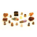 Thimbles and thimble cases comprising a coquilla nut acorn form example, 5cm, a pierced vegetable