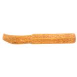 A finely carved boxwood knitting stick, probably Dutch, curved tail to a square stem, well carved