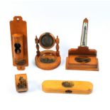 Mauchline ware - five pieces - comprising a curved end razor box (Leamington Lower Parade), 16cm,