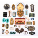 Two cased sets of buttons and a collection of buckles comprising two leather cased sets, each of six
