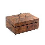 A mid 19th Century French burr elm sewing box of rectangular form, steel lid handle and ball feet,