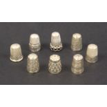 Eight English silver thimbles all in mint condition (8)