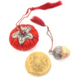 Two waxers and an emery comprising a strawberry form waxer with silver mount stamped 'Stirling',