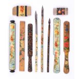 Mauchline ware - ten pieces all in floral patterns comprising three dip pens, three paper knives,